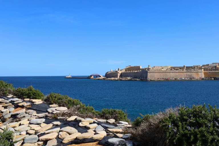 Scenic view of Valletta across the blue waters of the bay