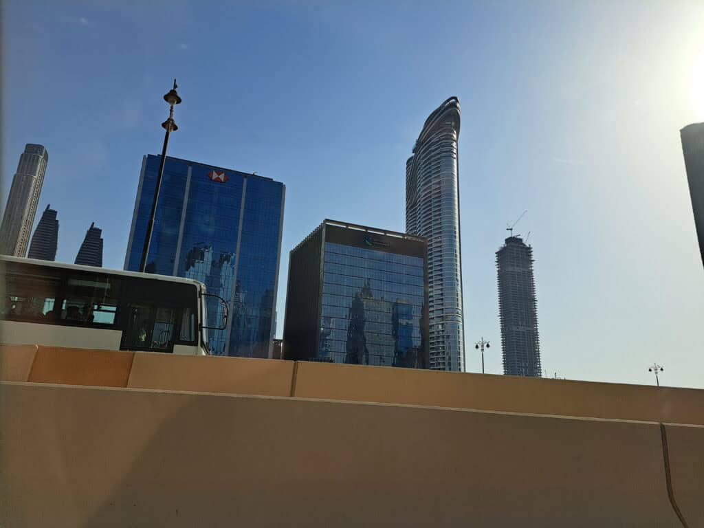 Towering buildings in Dubai’s financial district under a clear sky