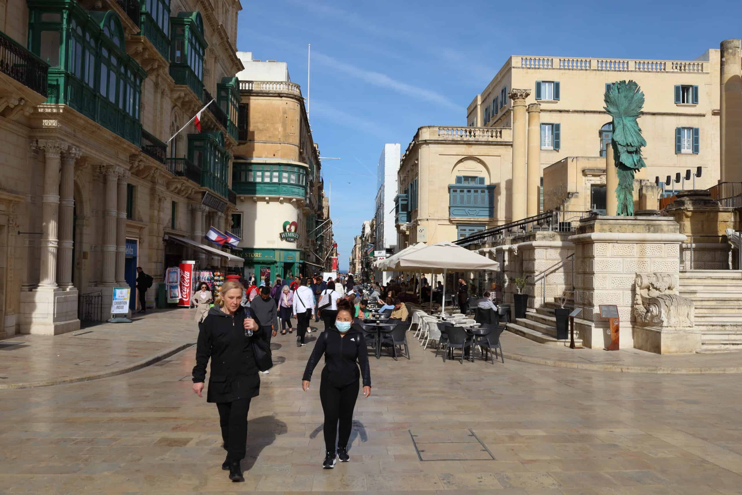 Stone entrance gate leading into Valletta’s Old Town square