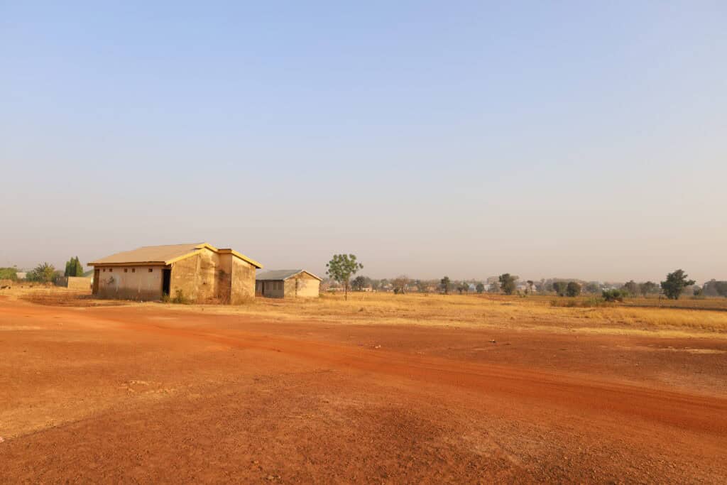 Isolated building in savanna near Tamale, Ghana.