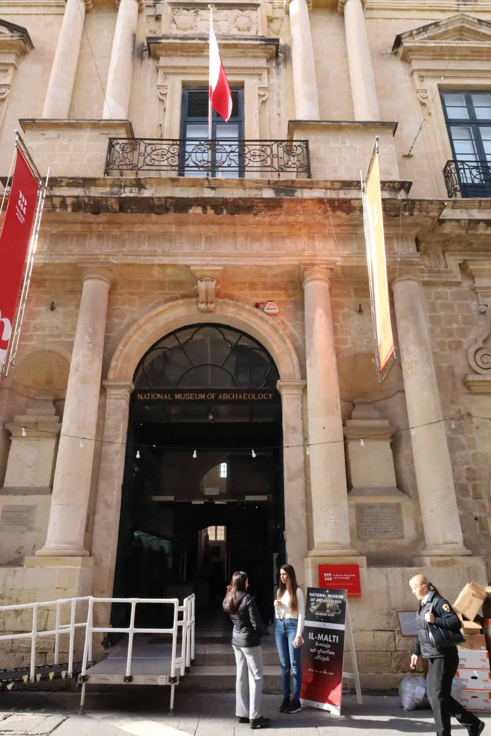 Official building in Valletta with two national flags