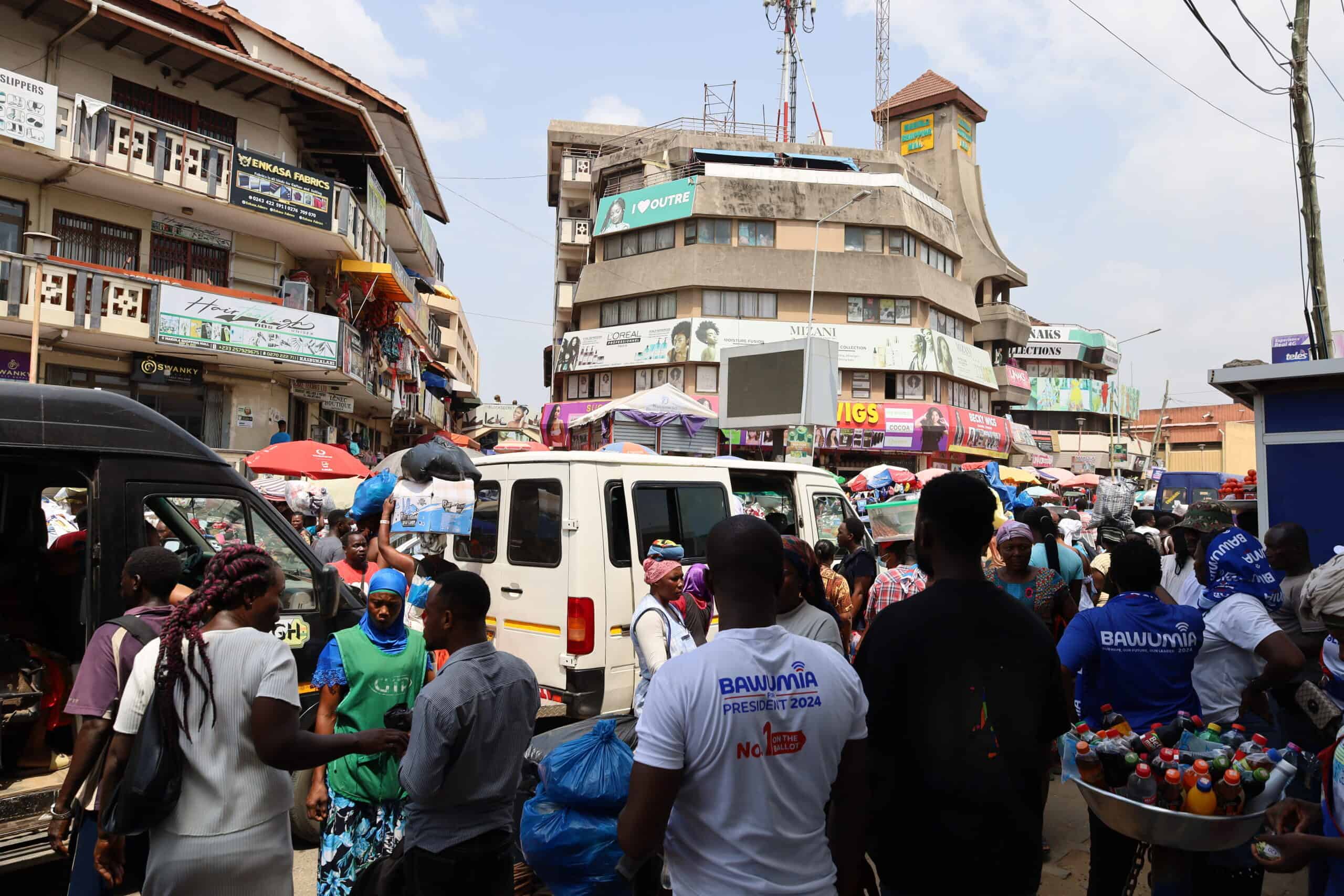 Crowds of shoppers and sellers busy at Makola Market in Accra
