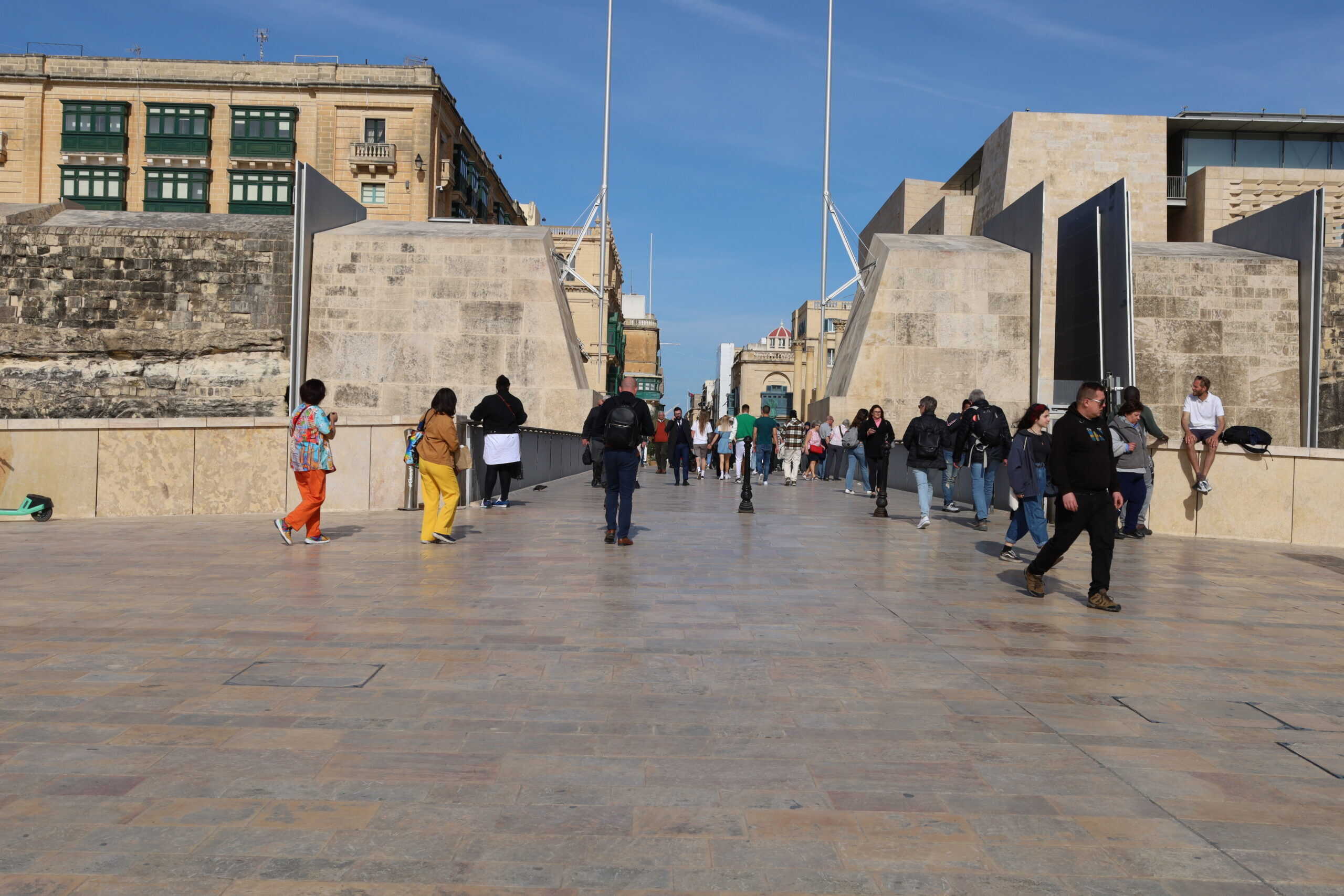 Visitors preparing to enter the historic city of Valletta