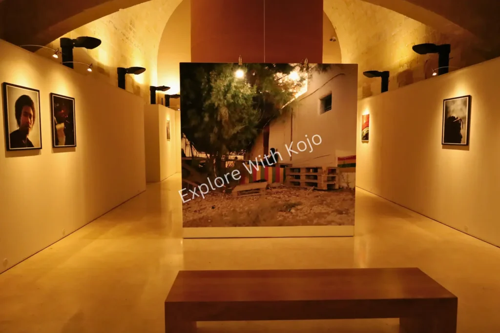 Art gallery exhibit with paintings in Malta.