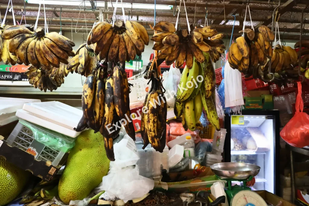 Bananas hanging at a fruit stall in Little India Singapore