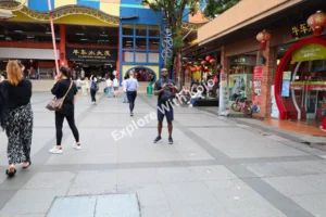 Tourists exploring Chinatown Singapore.