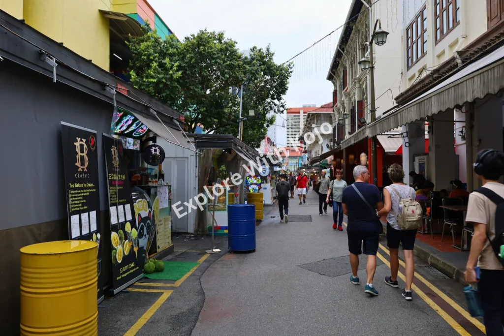 Chinatown street view with people walking in Singapore