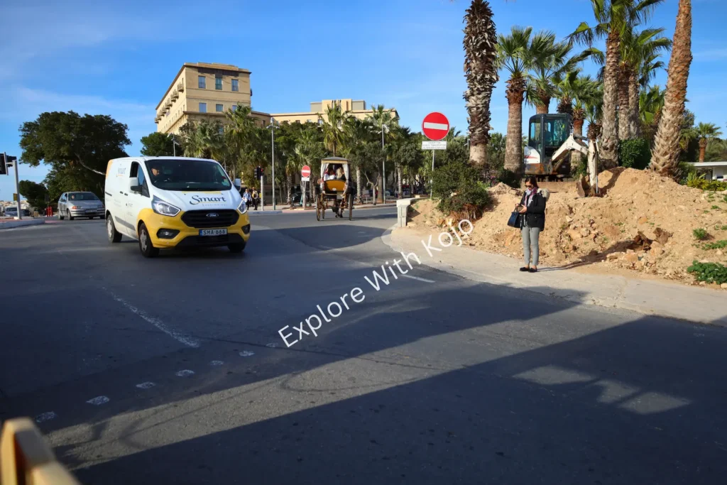 Construction site with traffic on a Maltese road.
