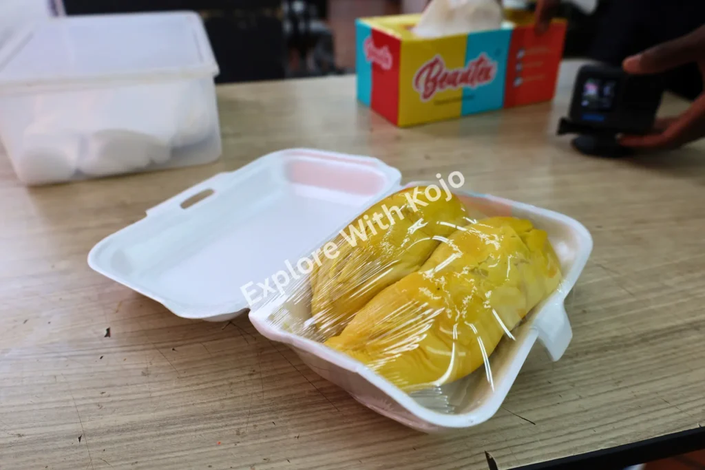 Durian fruit served in a container in Chinatown Singapore.