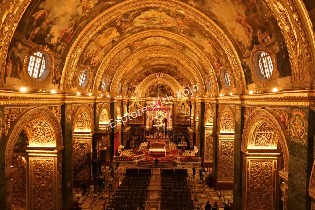 Ornate golden altar with Baroque details inside church&nbsp;in&nbsp;Malta.