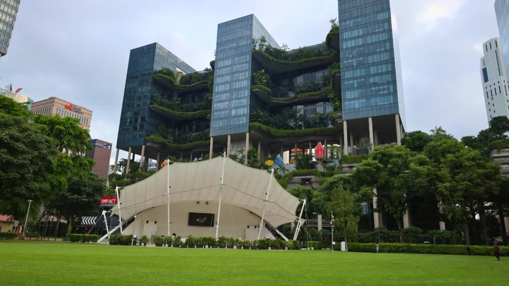 Open grassy field and trees at Hong Lim Park in downtown Singapore