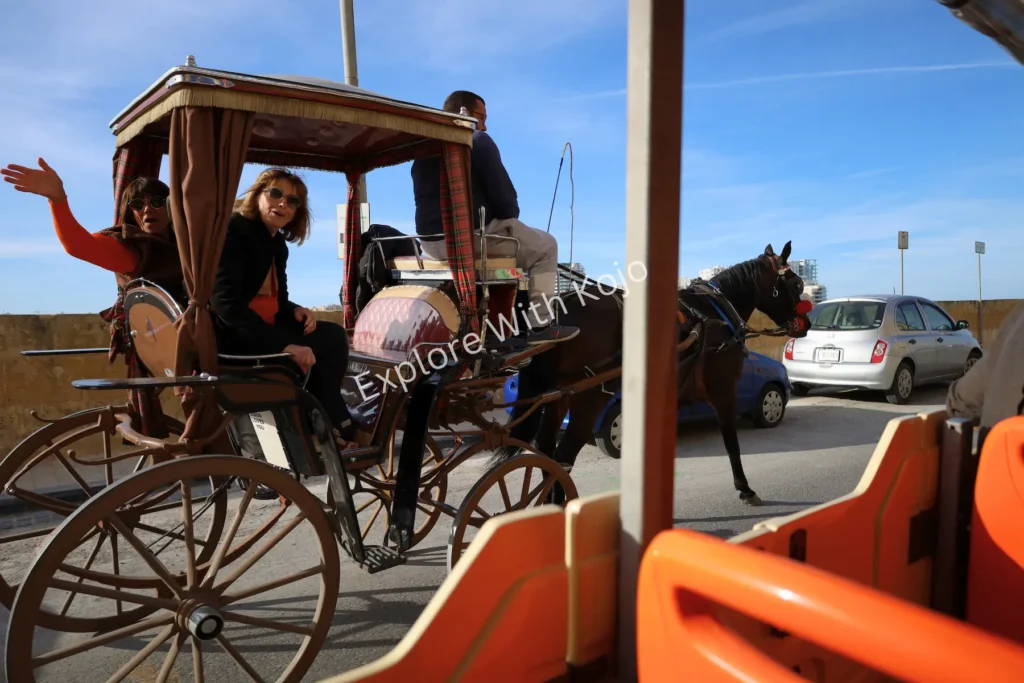 Horse-drawn carriage tour on the streets of Malta.