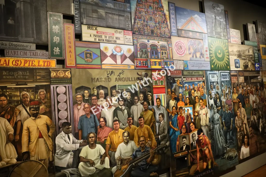 Large mural depicting a community gathering with diverse figures at the Indian Heritage Centre in Singapore