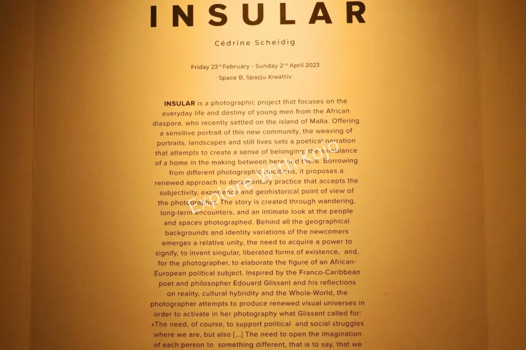 Insular art exhibition text panel displayed in Malta.