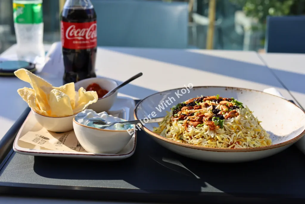 Plate of seafood rice dish served at a waterfront restaurant in Malta.
