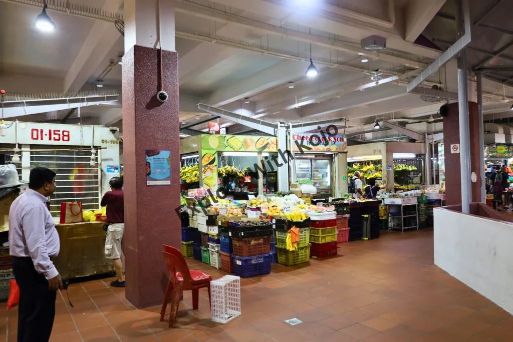 Fresh produce and goods displayed at market stalls in Little India Singapore