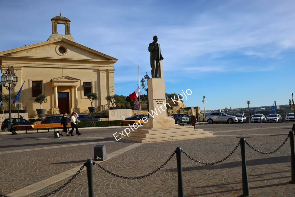 Chapel with statue in front near the seaside in Malta.