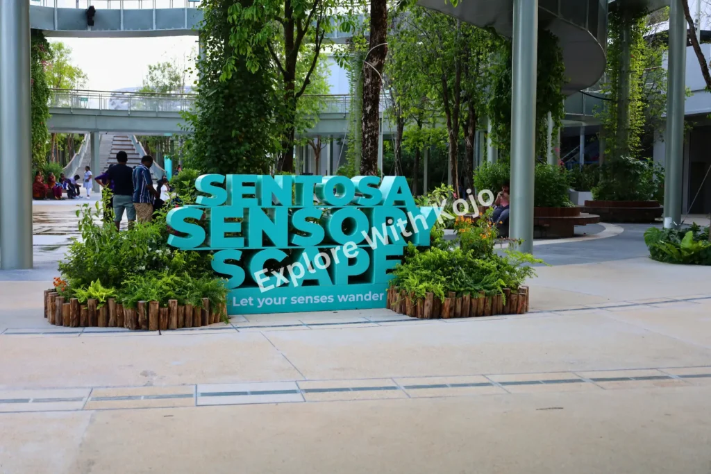The entrance sign of Sentosa Sensoryscape with greenery around it.
