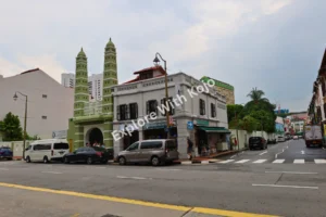 Green mosque at a street corner in Singapore&rsquo;s Kampong Glam.
