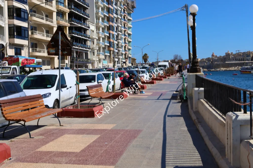 Benches along the waterfront promenade in Sliema, Malta.