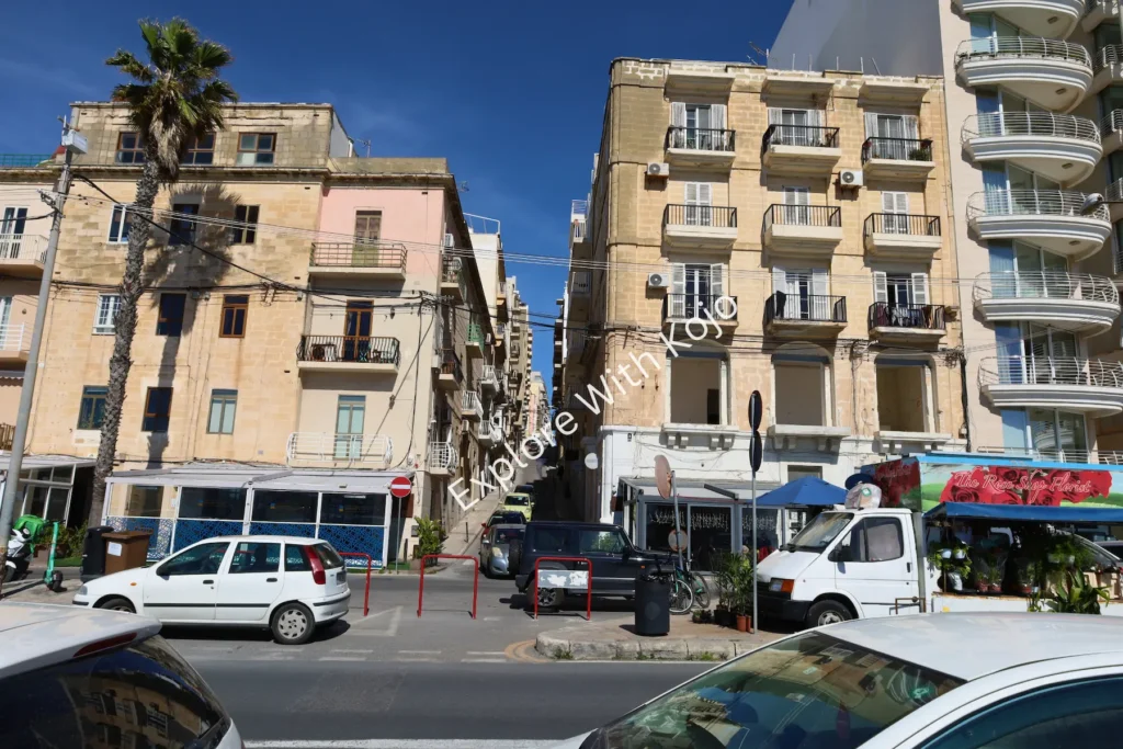 Urban street scene in Sliema Malta with cars and&nbsp;pedestrians.
