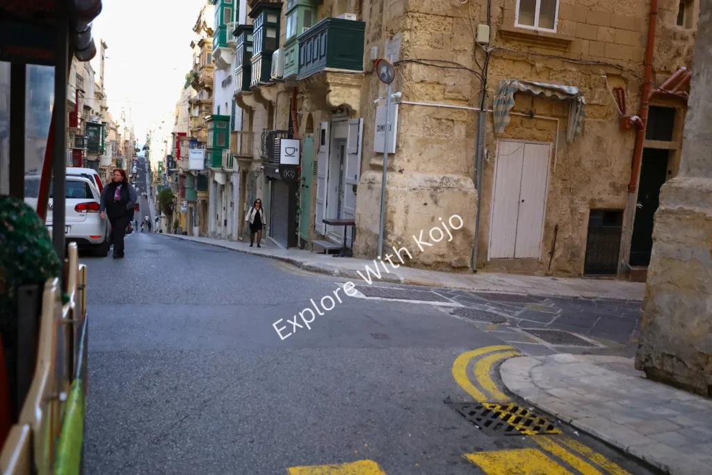 Alt Text: View from tour bus on Malta street.