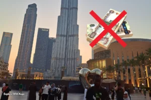 Burj Khalifa and Downtown Dubai with a symbol showing no cash, representing Dubai’s move toward becoming the world’s first cashless city by 2026.