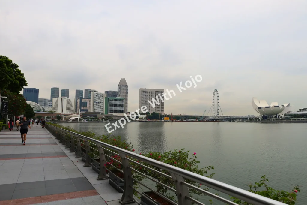 Marina Bay waterfront in Singapore photographed by Kojo showing the skyline, Singapore Flyer, and ArtScience Museum