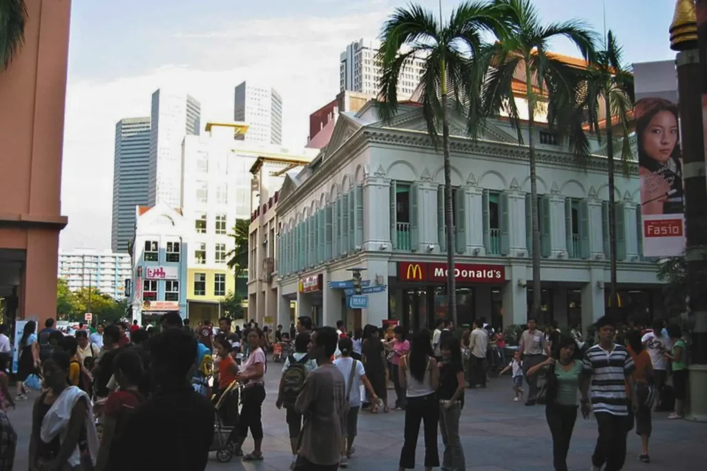 Bustling Bugis street with crowds and shops in Singapore