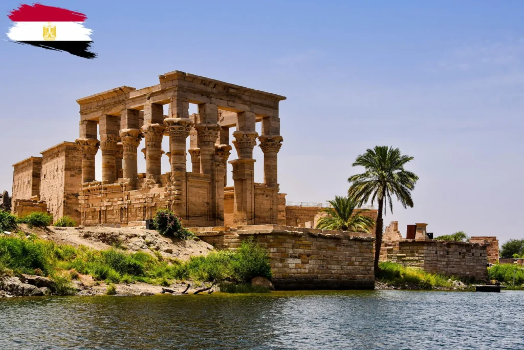 Ancient Egyptian temple ruins beside the Nile River.
