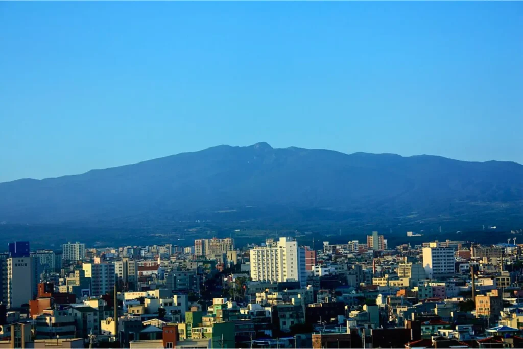 View of Jeju City with Hallasan Mountain in the background.