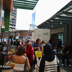Crowds of people walking in Bukit Bintang, Kuala Lumpur