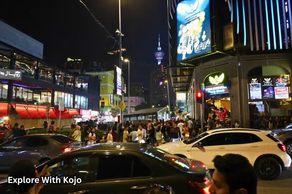 Bukit Bintang street traffic and nightlife in Kuala Lumpur