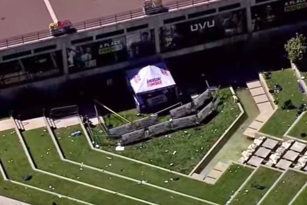 The aftermath of the Charlie Kirk shooting at Utah Valley University showing the event tent and scattered debris