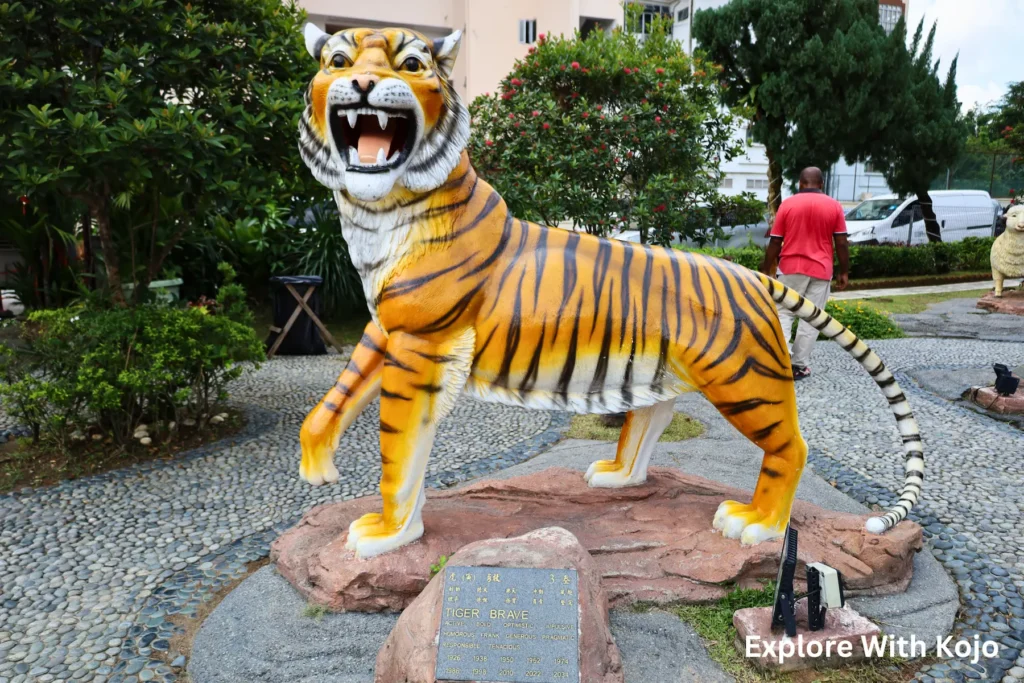 Tiger zodiac statue at Thean Hou Temple in Kuala Lumpur, representing bravery and strength.