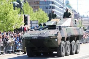 Finnish military vehicle in parade during Armed Forces Day in Helsinki.