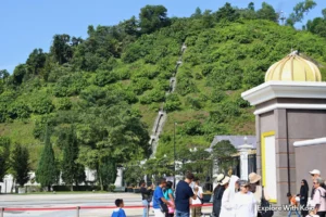 Visitors at the gates of Istana Negara, the King’s Palace in Kuala Lumpur, Malaysia