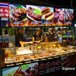 Jalan Alor stall selling grilled meats and skewers at night