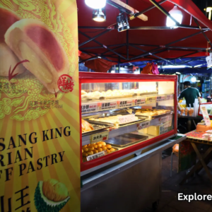 Food stall selling Musang King durian puffs at Jalan Alor Night Market