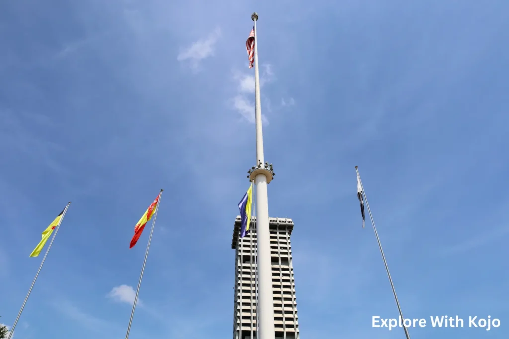 Kuala Lumpur Tower (KL Tower) standing tall against a clear blue sky