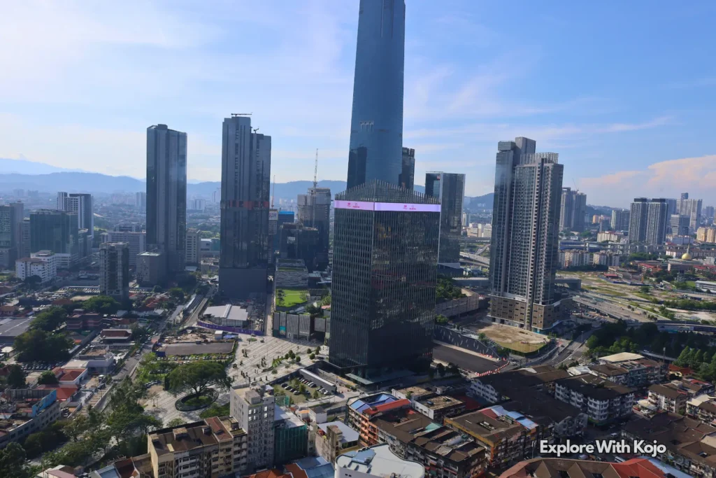 Panoramic skyline view of Kuala Lumpur with skyscrapers under clear sky