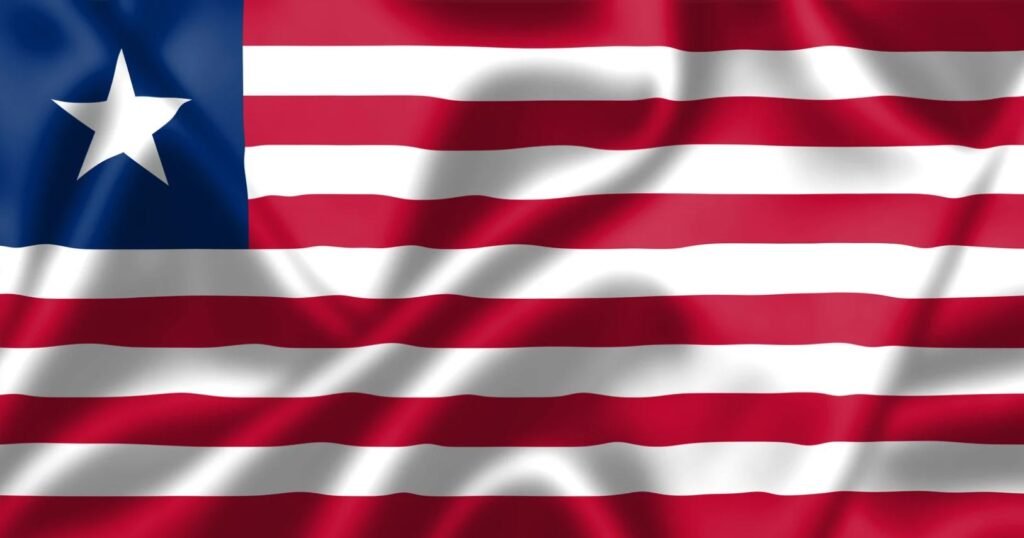 The national flag of Liberia featuring 11 red and white stripes and a single white star in a blue square