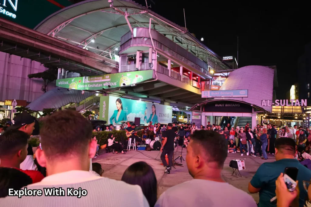 Pavilion Kuala Lumpur night scene with lights and crowds