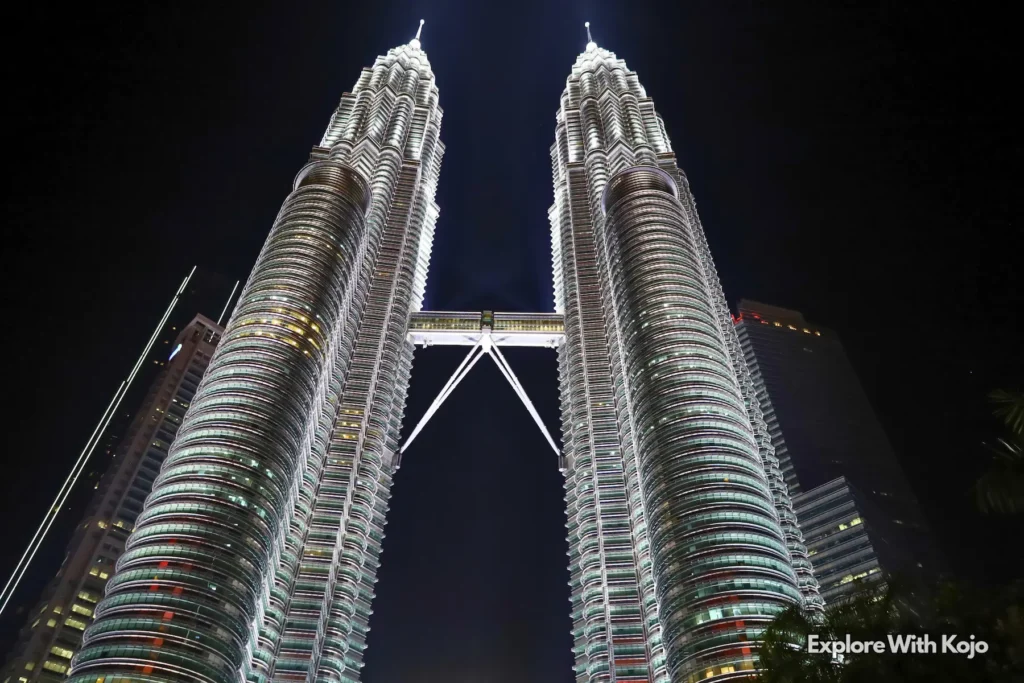 Petronas Twin Towers lit up at night in Kuala Lumpur, Malaysia