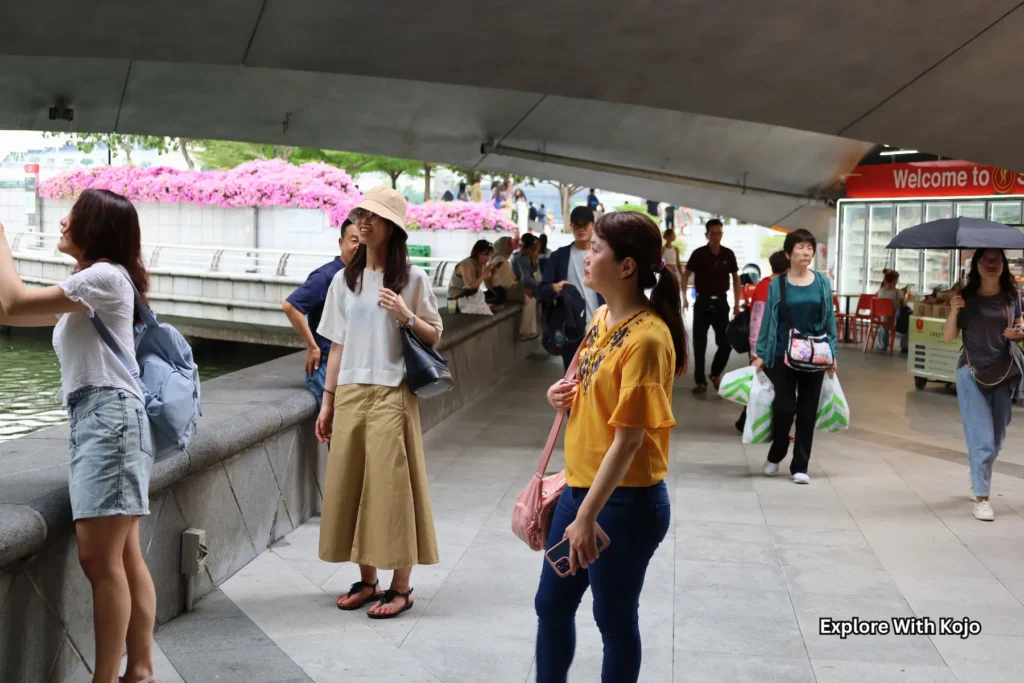 Visitors walking along the sheltered walkway at Gardens by the Bay in Singapore.