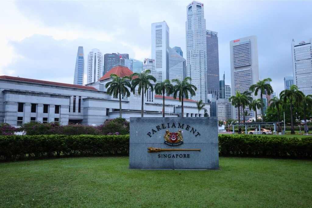 Parliament House of Singapore with city skyscrapers in the background.