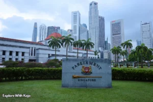 Singapore Parliament building with city skyline in the background, symbolizing governance and strict laws