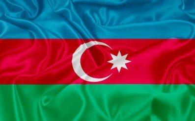 Flag of Azerbaijan with blue, red, and green horizontal stripes and a white crescent and star.