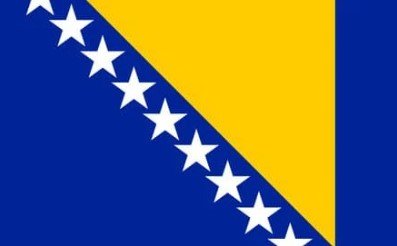 Flag of Bosnia and Herzegovina with blue field, yellow triangle, and white stars.