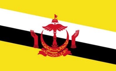 Flag of Brunei with yellow background and white and black diagonal stripes.